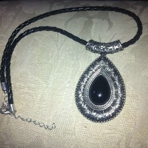Leather braided choker with silver pendant