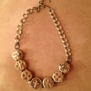 Beautiful coin cross necklace. Adjustable clasp.