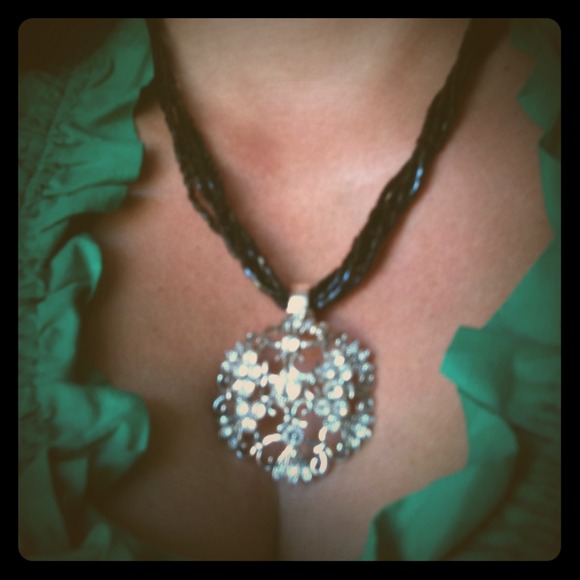 Multiple strain beaded black necklace with pendant