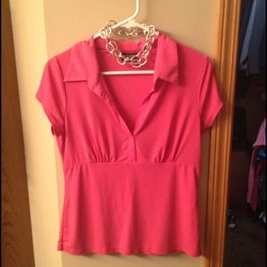 Bright pink V-neck shirt