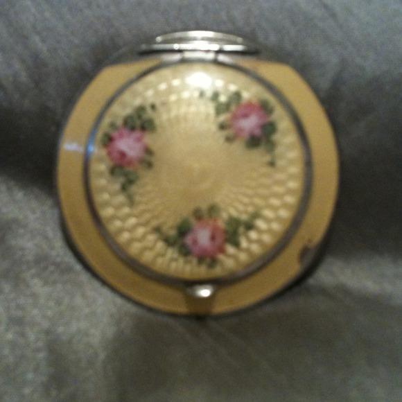 Hand crafted yellow compact with flowers
