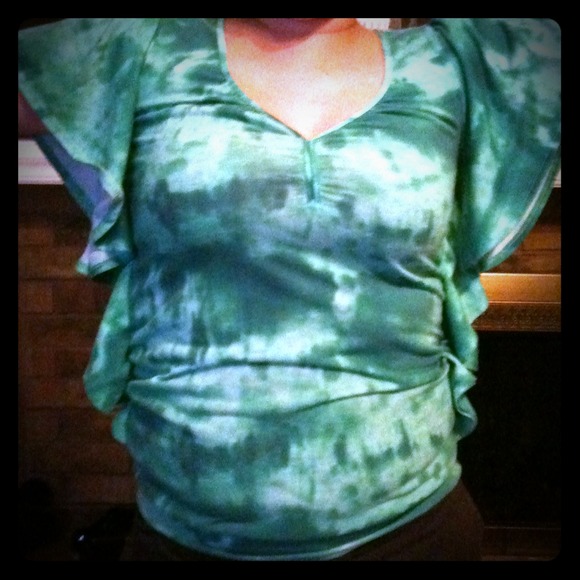 Green tied dyed shirt with outside ruffles?