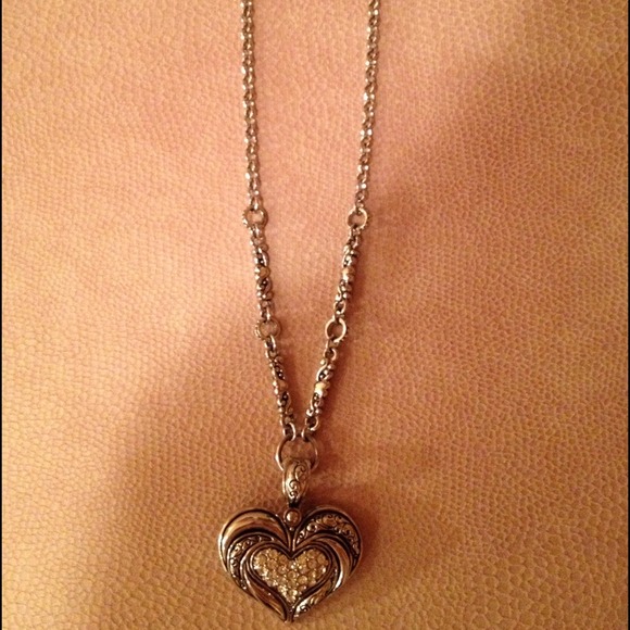 Rhinestone heart necklace with adjustable chain.