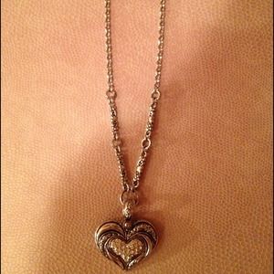 Rhinestone heart necklace with adjustable chain.