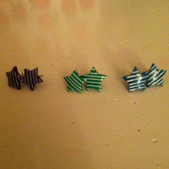 Earrings ( from left to right) purple, green, blue