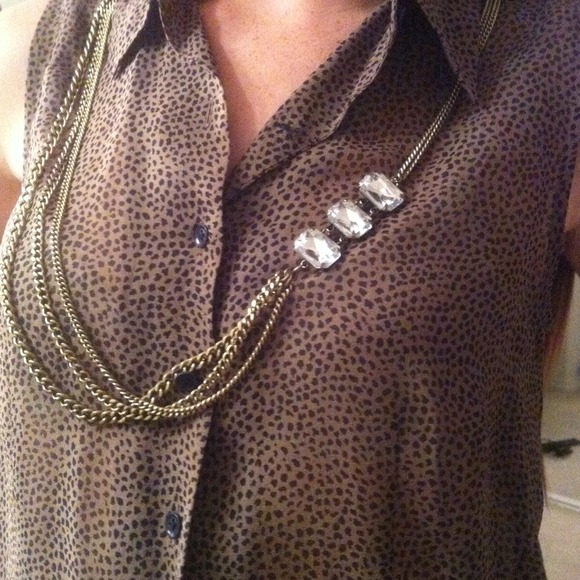 Gold chains and rhinestone necklace