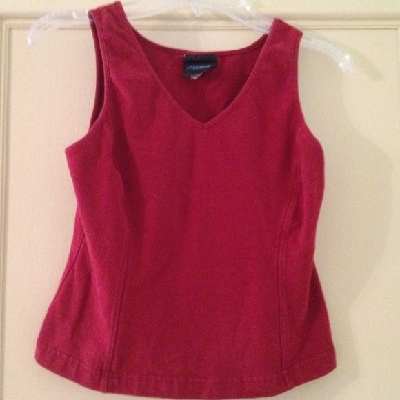 Women's small cropped maroon yoga top.