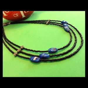 Three strand beaded black and blue tube necklace