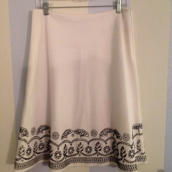 Expensive white skirt with beautiful bead work