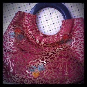 Red Handbag with Goden detail