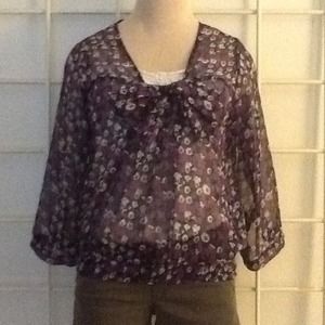 Reduced by $10. Sheer floral print top. Never worn