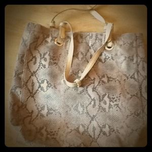 Gentle used snakeskin tote