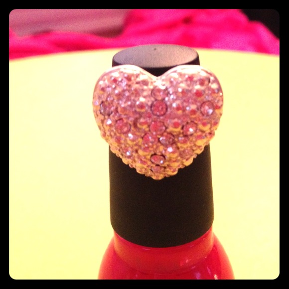 Heart-shaped rhinestone-covered ring...adjustable!
