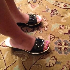 Michael Kors black sandals.