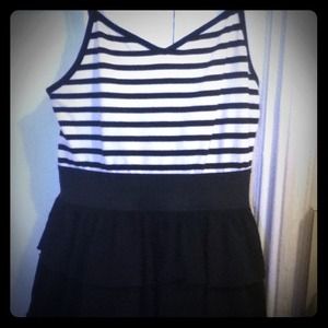 Black and white. Striped mini dress with ruffles