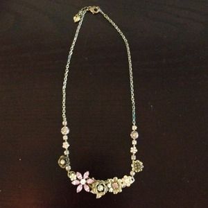 Gold and pink necklace & Vera Bradley purse