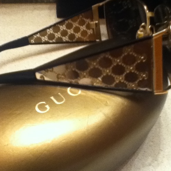 Gold and black vintage Gucci sunglasses