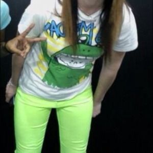 Neon green skinny jeans.