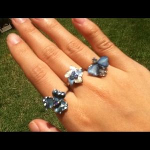 Three beautiful blue rings with sparkling crystals