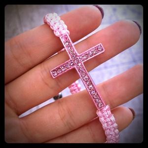 Cross hand braided bracelet.