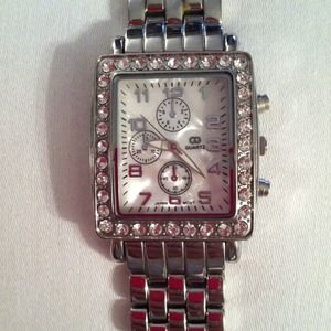 Silver watch with crystals