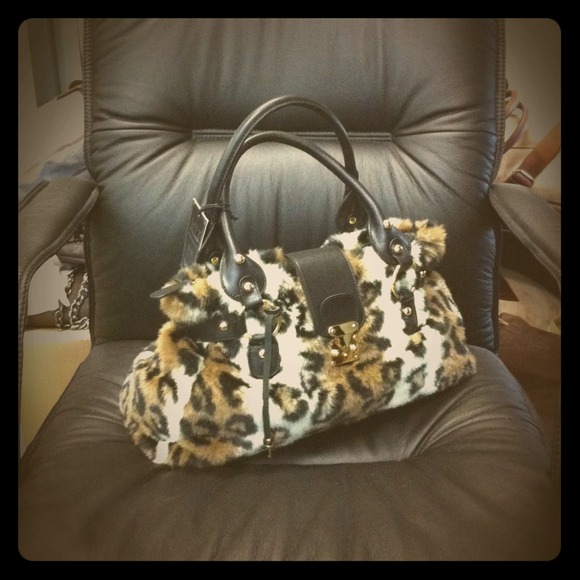 Real Leopard leather handbag.