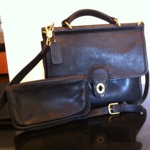 Black well loved leather coach purse