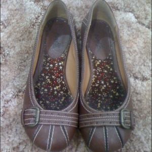 Brown leather flats