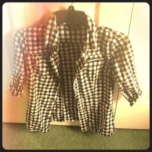 Checkerboard button up shirt.