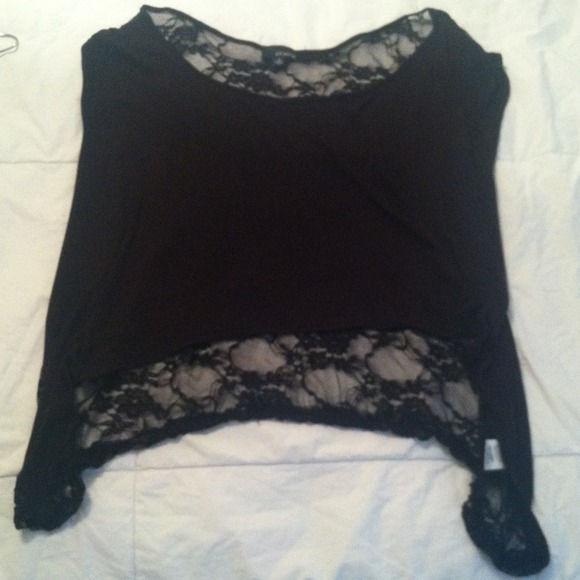 Very sheer black top with pure lace back