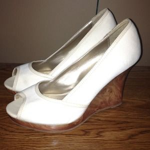Classy off white peep toe wedges