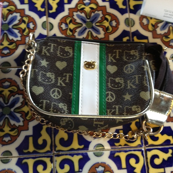 ***sold *** Hello kitty wristlets & purse