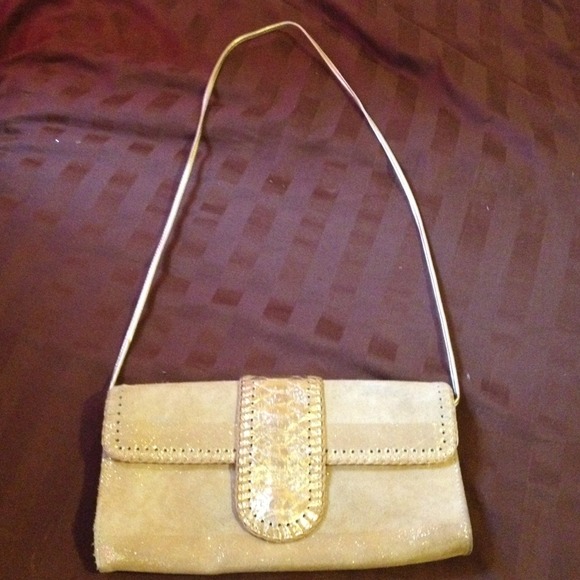 Carlos falchi golden clutch
