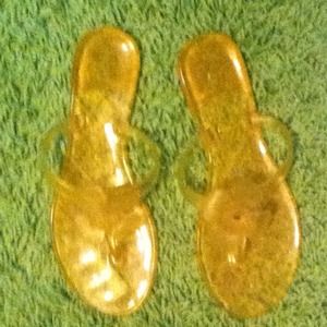 Yellow flower flip flops