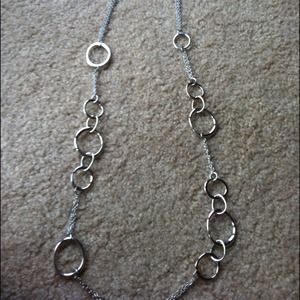 Silver hoop necklace.