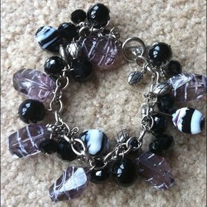 Black,white,and zebra bracelet.