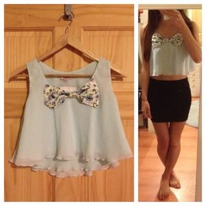 Cropped chiffon top with bow.