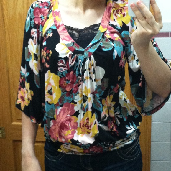 SOLD to @baygrl4 Black floral top