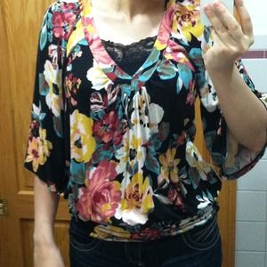 SOLD to @baygrl4 Black floral top