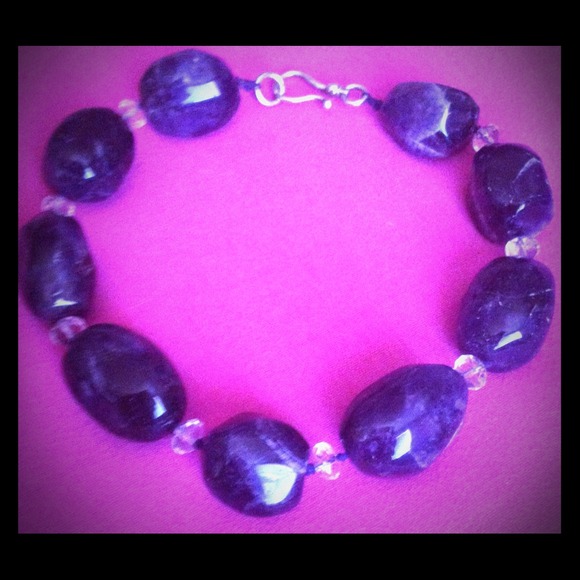 Large grape amethyst crystal glass necklace.