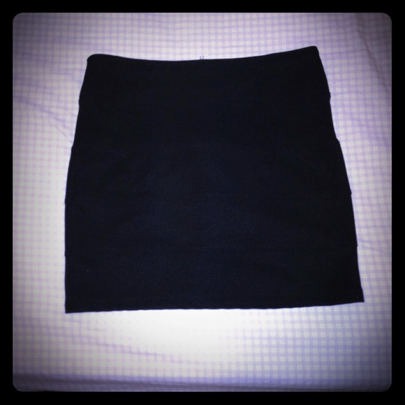 Dresses & Skirts - Reduced---Black bodycon skirt zipper shown in back
