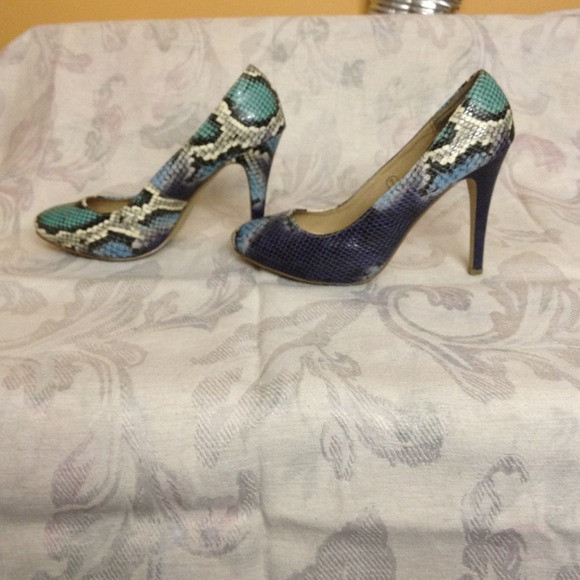 For COLT...Miss me size 7 snake skin shoes.