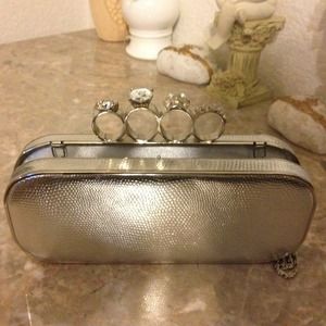 Silver knuckle clutch purse