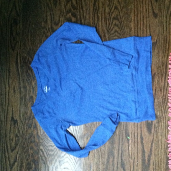 This is an old navy long sleeve tshirt in blue.
