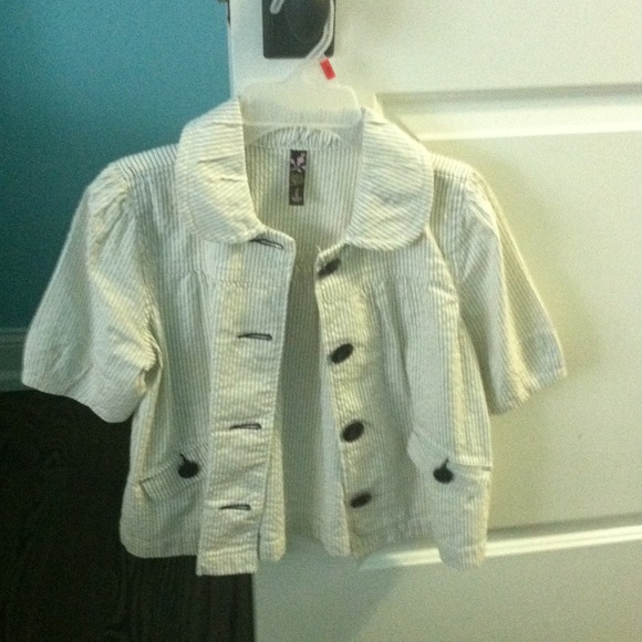 A navy stripped jacket with navy buttons.