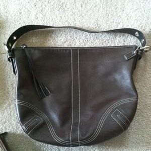 Authentic brown leather coach hobo handbag.