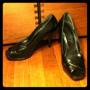 Black open-toe pumps