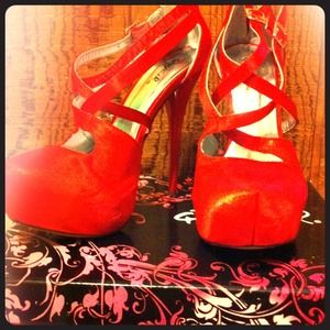 Satin red pumps