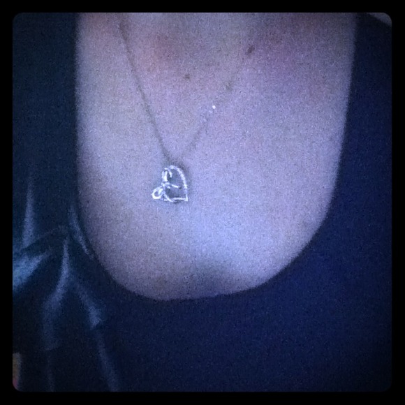 Heart and bow necklace & silver top.