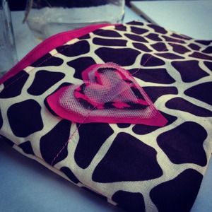 Brown and pink animal print clutch